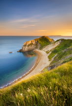 Jurassic Coast Beach pictured from cliffside at sunset